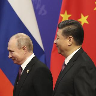 Les présidents russe et chinois, ici en avril 2019 à Pékin. [AP/Keystone - Kenzaburo Fukuhara]