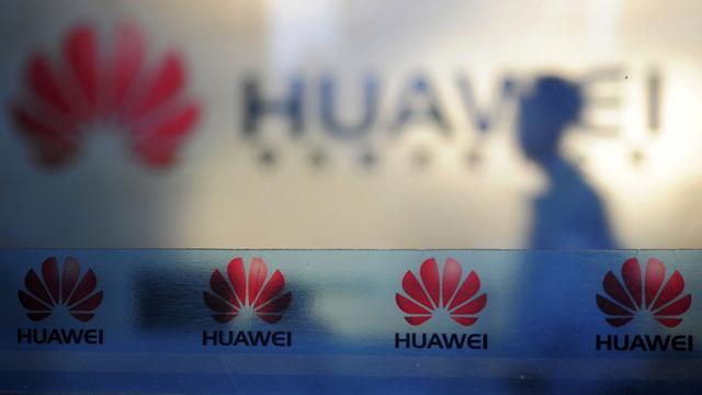 Huawei. [AP Chinatopix/Keystone - Huawei est une entreprise privée et elle est partenaire de Swisscom et Sunrise notamment.]