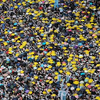 Mobilisation monstre contre une nouvelle loi d'extradition à Hong Kong. [Reuters - Thomas Peter]