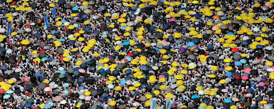 Mobilisation monstre contre une nouvelle loi d'extradition à Hong Kong. [Reuters - Thomas Peter]