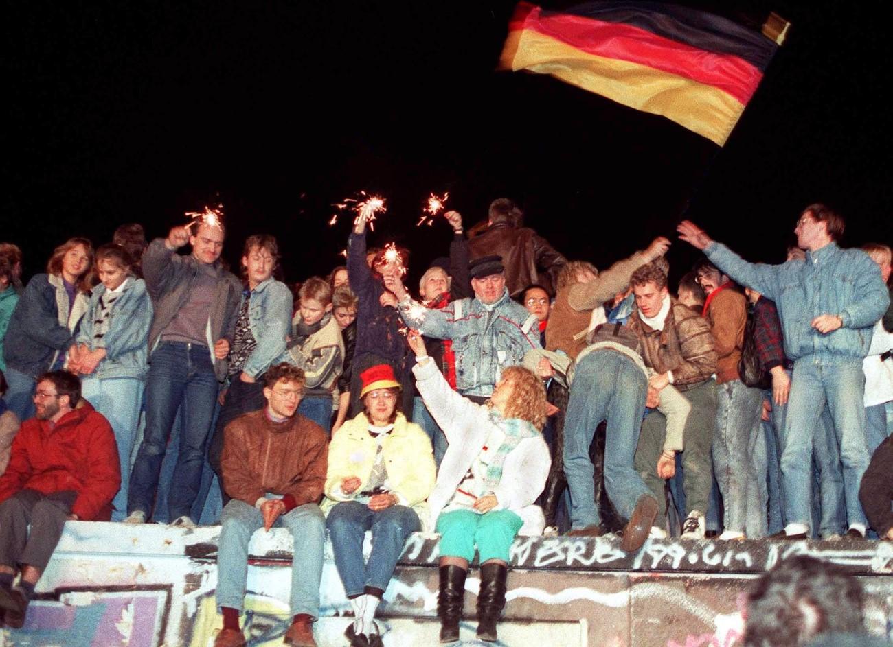 Berlin, la nuit où le Mur est tombé, 1989. [Keystone]