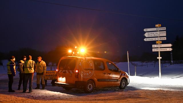 Les recherches étaient rendues difficiles en raison de la neige et du manque de visibilité. [AFP - Fabrice Coffrini]