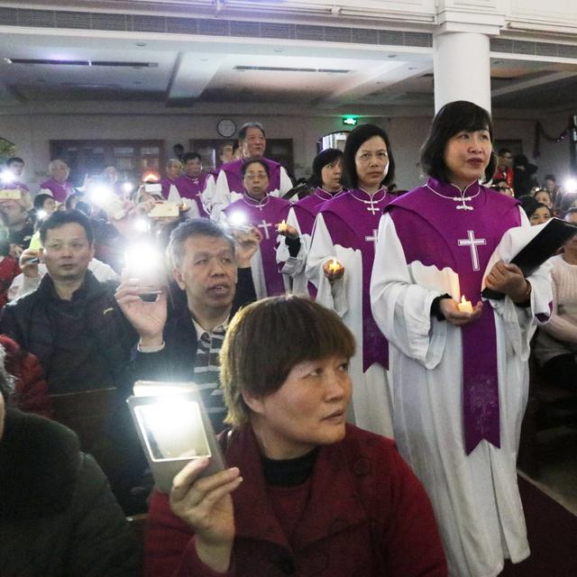 Des chrétiens dans une église officiellement approuvée par le gouvernement chinois à Guangzhou, dans la province de Guangdong, le 24 décembre 2018. [The Yomiuri Shimbun - Jun Yasukawa]