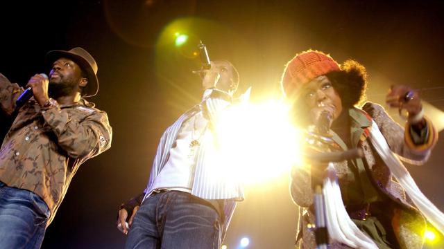 The Fugees (Lauryn Hill, Michel Prakazrel et Wyclef Jean) à Zurich en 2005. [Keystone - Eddy Risch]