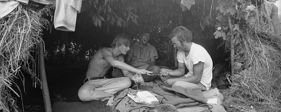 Des festivaliers à Woodstock en août 1969. [AP/Keystone]