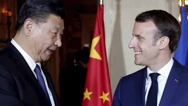 Le président chinois Xi Jiping est reçu par Emmanuel Macron, le 24 mars 2019. [Keystone - Jean-Paul Pelissier]