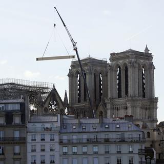 La reconstruction de Notre-Dame s'annonce longue et coûteuse. [AP Photo/Keystone - Francois Mori]