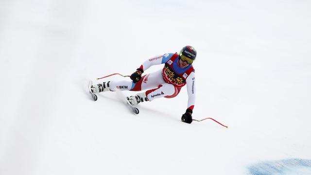 Beat Feuz a signé un nouveau podium, le 14e en 16 courses. [Keystone - Gabriele Facciotti]