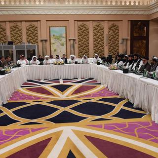 Des négociations entre les Etats-Unis et les représentants des Talibans se sont tenues à Doha durant des mois avant d'être interrompues par Donald Trump, suite à un nouvel attentat. [Keystone]