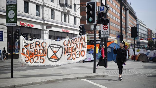 Les blocages écologiques à Londres ont été interrompu lundi. [AFP - Tolga Akmen]