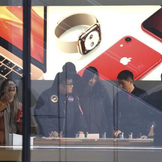 Les sous-traitants d'Apple tournent au ralenti en Chine. [AP Photo/Keystone - Ng Han Guan]