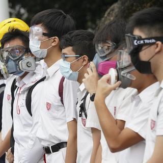 Le mouvement de contestation à Hong Kong appelle au boycott des universités et à la grève générale. [Keystone]