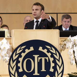 Emmanuel Macron a plaidé pour le renforcement du rôle de l'OIT dans un cadre multilatéral. [Keystone - Salvatore Di Nolfi]