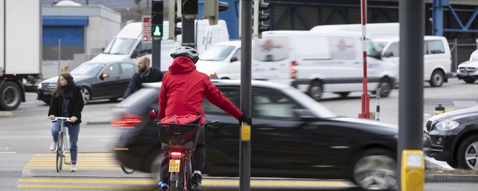 Le vélotaff, ou se rendre au travail en vélo. [Keystone - Gaetan Bally]