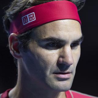 Roger Federer affronte Dominic Thiem pour son entrée en lice aux Masters de Londres. [Keystone - Georgios Kefalas]