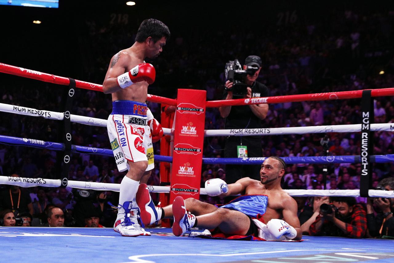 Manny Pacquiao est le seul boxeur à avoir été sacré champion dans 8 catégories de poids différentes. [KEYSTONE - Etienne Laurent]