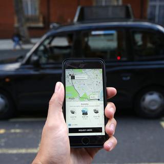 Uber compte 45'000 conducteurs et 3,5 millions de clients dans la capitale britannique. [AFP - Daniel Leal-Olivas]