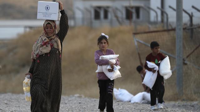 Réfugiés syriens dans le camp de Bardarash, au Kurdistan irakien. [Keystone - HUSSEIN MALLA - AP]