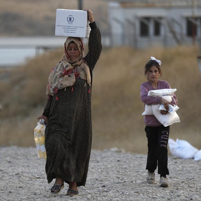 Réfugiés syriens dans le camp de Bardarash, au Kurdistan irakien. [Keystone - HUSSEIN MALLA - AP]