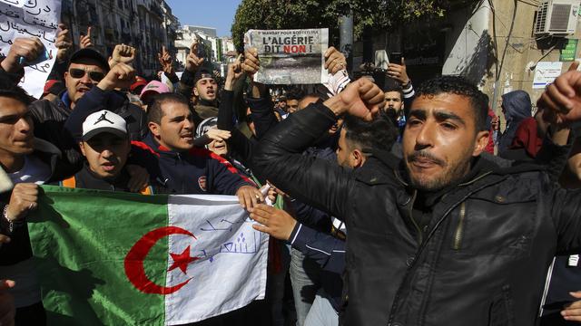 Les Algériens ont manifesté contre un 5e mandat du président Abdelaziz Bouteflika. [AP Photo/Keystone - Anis Belghoul]