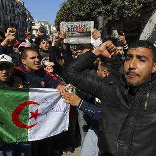 Les Algériens ont manifesté contre un 5e mandat du président Abdelaziz Bouteflika. [AP Photo/Keystone - Anis Belghoul]