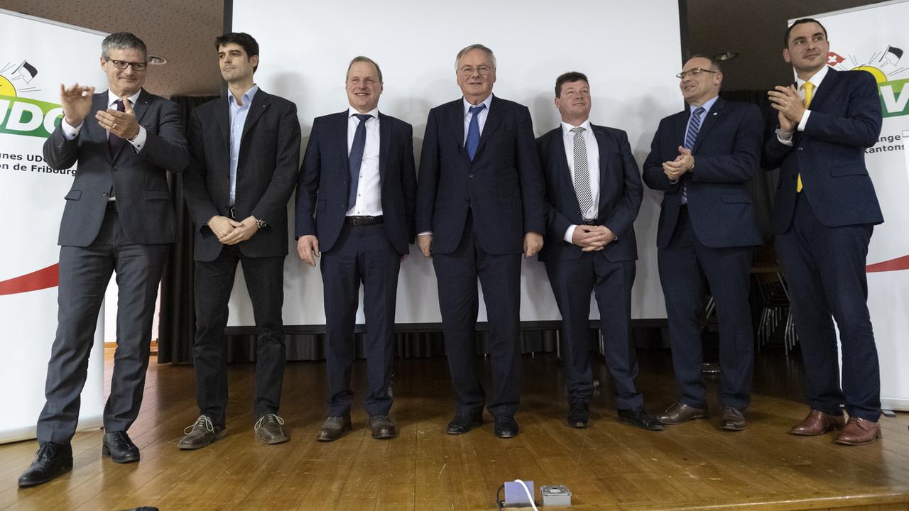 Les 7 candidats de l'UDC fribourgeoise sélectionnés pour les élections fédérale d'octobre. [Keystone - Adrien Perritaz]