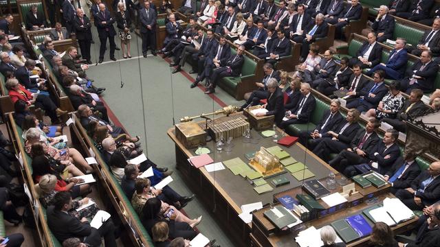 Theresa May s'est exprimée mercredi devant les députés, sans les convaincre de soutenir son plan. [Keystone - EPA/Jessica Taylor]