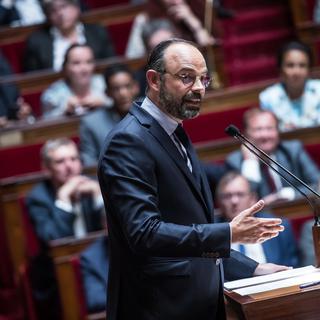 Le Premier ministre français Edouard Philippe présente son deuxième discours de politique générale devant l'Assemblée nationale. [Keystone - Christophe Petit Tesson]