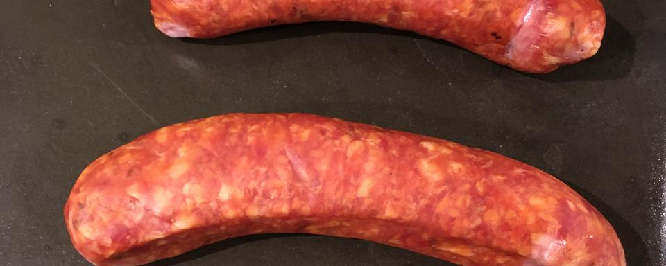 La saucisse d'Ajoie (IGP) a la particularité de contenir du cumin.