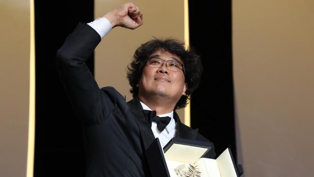 Bong Joon-ho a remporté la Palme d'or à Cannes. [AFP - Valery Hache]