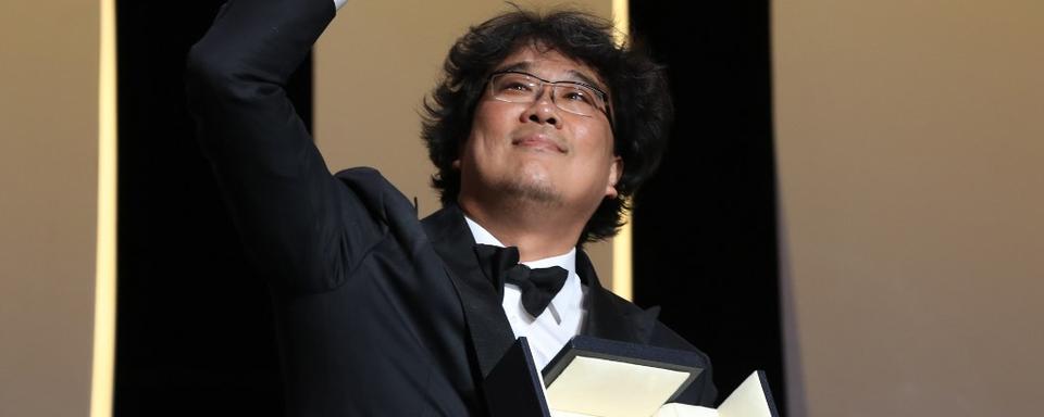 Bong Joon-ho a remporté la Palme d'or à Cannes. [AFP - Valery Hache]