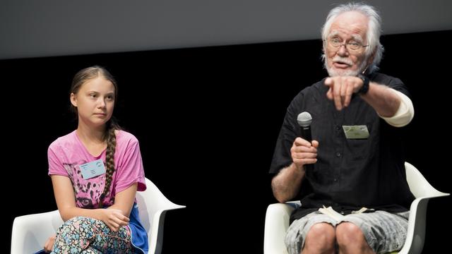 Jacques Dubochet et Greta Thunberg lors du sommet des grèves du climat. [Keystone - Jean-Christophe Bott]