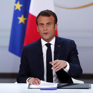 Emmanuel Macron annonce une série de réforme en réponse au grand débat. [EPA/Keystone - Ian Langsdon]