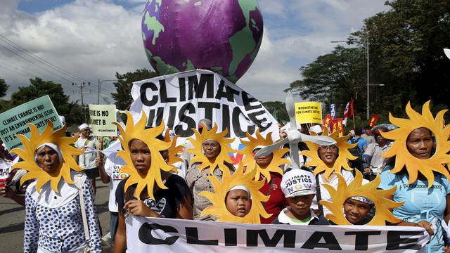 Manifestation pour le climat aux Philippines. [Reuters - Erik De Castro]