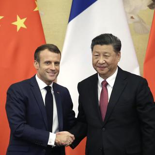 Emmanuel Macron (gauche) et Xi Jinping, après une conférence de presse à Pékin. ce 6 novembre 2019. [Jason Lee - Pool Photo via AP]
