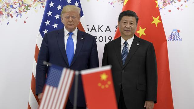 Donald Trump et Xi Jinping lors du sommet du G20 à Osaka. [AP/Keystone - Susan Walsh]