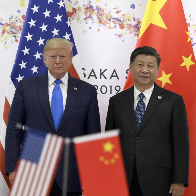 Donald Trump et Xi Jinping lors du sommet du G20 à Osaka. [AP/Keystone - Susan Walsh]