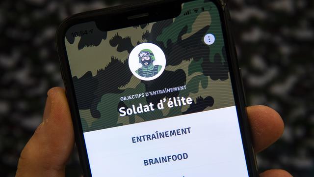 L'application #teamarmee s'adresse en priorité aux jeunes hommes et jeunes femmes de 14 à 18 ans. [Keystone - Anthony Anex]