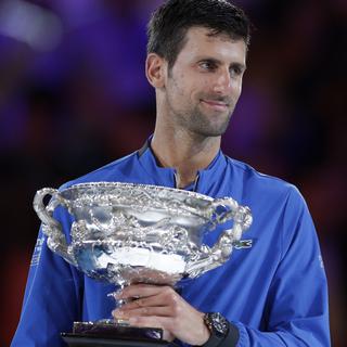Novak Djokovic remporte aisément l'Open d'Australie [Keystone/EPA - Lynn Bo Bo]