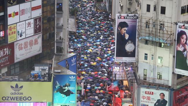 Le centre de Hong Kong, où se trouvent les boutiques de luxe et le quartier d'affaires, est aussi le rendez-vous des manifestants. [AFP - EYEPRESS NEWS / EYEPRESS]