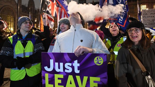 Les partisans du Brexit devant le Parlement britannique, le 29 janvier 2019. [Keystone - Andy Rain]