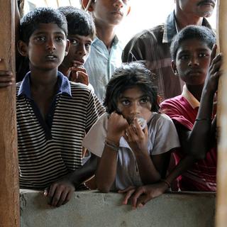 Des centaines d'enfants sri-lankais ont été adoptés illégalement en Suisse dans les années 1980 (image d'illustration). [AFP - Pedro Ugarte]