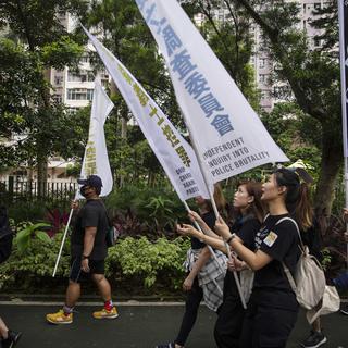 Des manifestants hongkongais dans le neuvième week-end consécutif de démonstrations contre la loi d'extradition vers la Chine. [EPA/Keystone - Chan Long Hei]