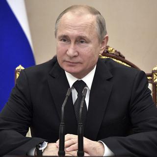 Vladimir Poutine a à son tour annoncé le retrait de la Russie du traité sur les armes nucléaires. [Keystone - Alexei Nikolsky, Sputnik, Kremlin Pool Photo via AP]