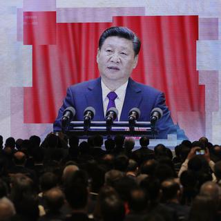 Le président Xi Jinping annonce le ''Outline Development Plan for the Guangdong-Hong Kong-Macao, Greater Bay Area'' à Hong Kong en février 2019. [AP/Keystone - Kin Cheung]