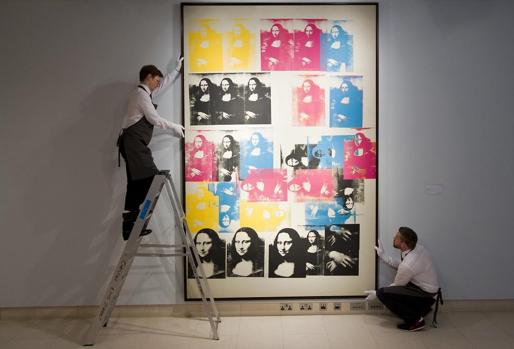 "La Joconde", revue et multipliée par Andy Warhol, en 1963. [AFP - JUSTIN TALLIS]