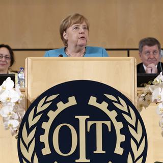 Angela Merkel prend la parole pour célébrer les 100 ans de l'Organisation internationale du travail. [Keystone - Salvatore DiNolfi]