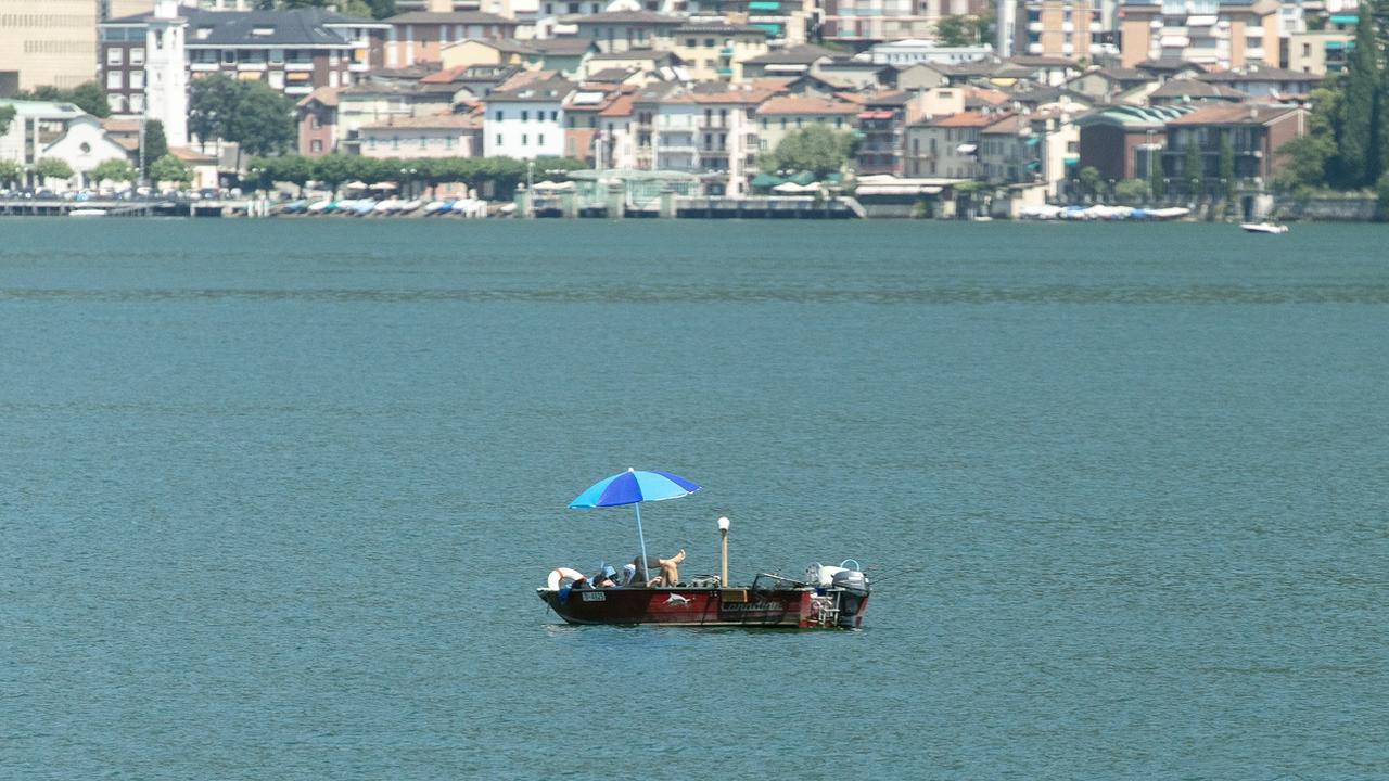 Un bateau de plaisance sur le lac de Lugano en août 2018. (Image d'illustration) [KEYSTONE/Ti-Press - Luca Crivelli]