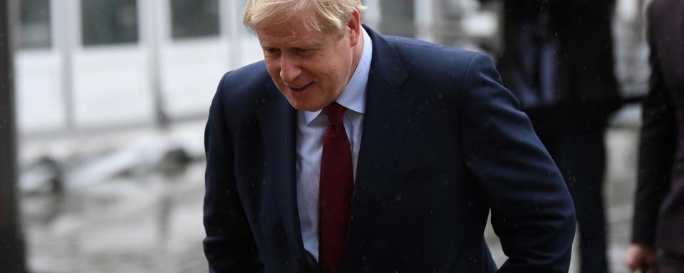 Boris Johnson enverra à l'Union européenne une lettre demandant un report du Brexit si aucun accord n'est conclu d'ici au 19 octobre. [EPA/Keystone - Neil Hall]