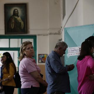 Les élections sont triples en Grèce dimanche. [Keystone - Yannis Kolesidis]